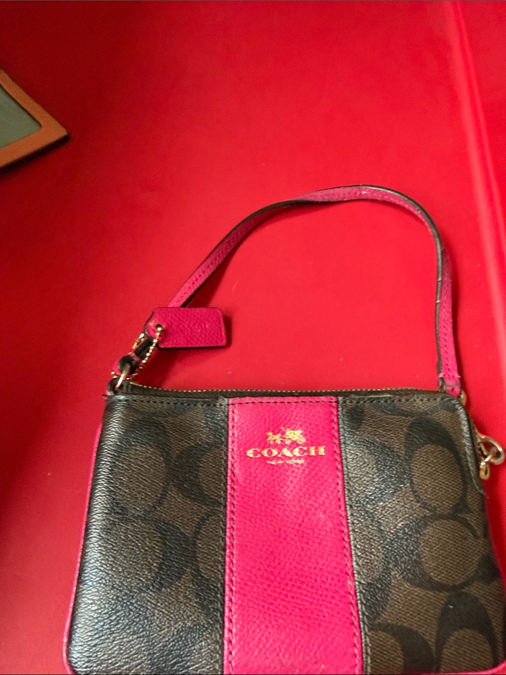 Coach Brown Signature Canvas Wristlet with Pink Center Stripe used